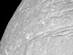 12.10.2005 - Krátery poseté ledové útesy na Saturnově Tethysu