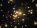 17.09.2013 - Kupa galaxií Abell 1689 ohýbá světlo