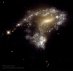 20.02.2024 - AM1054: Tvorba hvězd při srážce galaxií