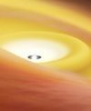 Autor: RIKEN - Umělecká představa zdeformovaného protoplanetárního disku u mladé hvězdy L1527