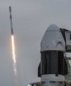 Autor: SpaceX - Falcon 9 startuje 21. 4. 2022 s 53 družicemi sítě Starlink zatímco v popředí již čeká Crew Dragon na špici dalšího Falconu 9, který poletí na misi Crew-4 k ISS