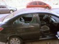 Autor: Daniel Sokol. - Automobil s rozbitým sklem po loupeži v Bariloche.