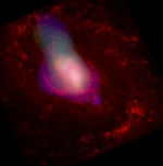 ngc 1068 slozeny snimek - rentgenove zareni (cervena), viditelne svetlo (zelena)