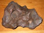 Železný meteorit (5700 g) z Arizonského kráteru.