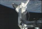 Raketoplán Discovery připojený k ISS