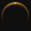 Odraz slunečního světla od hladiny jezera na povrchu měsíce Titan