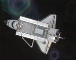 Discovery při odletu od ISS