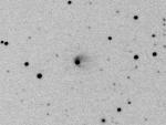Snímek malé planetky (596) Scheila. Autoři: Ernesto Guido a Giovanni Sostero.
