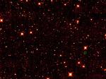 Snímek prvního Trojana Země pořízený v říjnu 2010 družicí WISE na vlnové délce 4,6 mikronů.