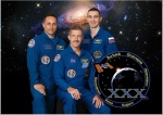 Posádka přistávajícího Sojuzu, zleva A. Škaplerov, D. Burbank a A. Ivanišin. Autor: TV NASA