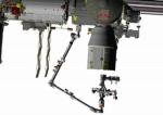 Animace robota Dextre u lodi Dragon. Autor: NASASpaceFlight.com