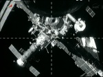 Pohled na stanici z odlétajícího Progressu M-19M 11. června Autor: TV NASA