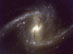 13.04.2003 - NGC 1365: Blízká spirální galaxie s příčkou