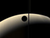 20.07.2008 - Srpek měsíce Rhea zakrývá srpek Saturnu