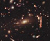 17.10.2011 - MACS 1206: Gravitační čočka z kupy galaxií
