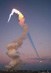 27.11.2011 - Stín kouřové vlečky raketoplánu míří k Měsíci
