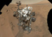 27.12.2012 - Vozítko Curiosity u hnízda kamenů na Marsu