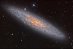 15.02.2024 - NGC 253: Prašný vesmírný ostrov