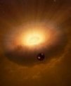Autor: Sarah Stewart/UC Davis - Umělecká představa nové teorie vysvětlující vznik Země a Měsíce