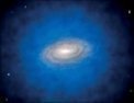 Autor: ESO/L. Calçada - Umělecké ztvárnění spirální galaxie ponořené v neviditelné temné hmotě, označované jako halo temné hmoty, které je zobrazeno modrou barvou