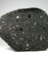 Autor: Wikimedia Commons - Meteorit Allende, uhlíkatý chondrit typu CV3