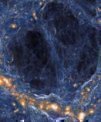 Autor: TNG Collaboration - Uvnitř plynných filamentů (modrá barva) spojujících galaxie (oranžová barva) se výjimečně nacházejí kapsy čistého plynu bez hvězd