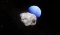 Autor: ESA/Hubble, NASA, L. Calçada - Umělecké ztvárnění měsíce planety Neptun s názvem Hippocamp