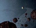 Autor: NASA/JPL-Caltech - Dvě skupiny Trojanů na dráze Jupitera před a za planetou ve směru oběhu