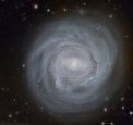 Anemická spirální galaxie NGC 4921 z Hubbla