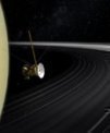 Autor: NASA - Sonda Cassini prolétává mezi Saturnem a prstenci – umělecké ztvárnění