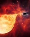 Autor: Hubble/NASA/ESA/M. Kornmesser - Na uměleckém zpracování je ztvárněna hvězda, kterou postupně trhá na kousky černá díra střední velikosti