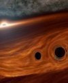 Autor: R Hurt (IPAC)/Caltech - Dvojice černých děr se obíhá v akrečním disku supermasivní černé díry, představa grafika