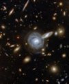 Fotografie pořízená pomocí Hubbleova teleskopu zachycuje pozoruhodnou kupu galaxií ACO S 295