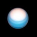 Autor: NASA, ESA, A. Simon (Goddard Space Flight Center), and M.H. Wong (University of California, Berkeley - Snímek Uranu pořízený pomocí HST 25. 10. 2021 ukazuje jasnou polární oblast planety