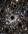 Autor: NASA/ESA/Hubble/N. Bartmann - Umělecké ztvárnění skupiny černých děr hvězdné velikosti