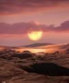 Autor: NASA/Ames Research Center/Daniel Rutter - Umělecká představa kamenné exoplanety Wolf 1069 b o hmotnosti Země. Pokud si planeta zachovala atmosféru, je velká šance, že by se v rozsáhlých oblastech na její denní straně nacházela kapalná voda a podmínky pro život.