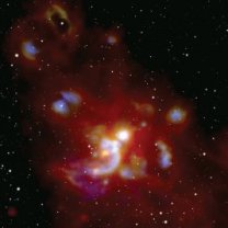 Pohled na hvězdotvornou oblast W51 pomocí infračervené observatoře SOFIA. Hvězdy do snímku byly vzaty z fotografií Sloan Digital Sky Survey. Autor: NASA/SOFIA/Lim and De Buizer et al. and Sloan Digital Sky Survey