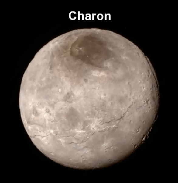 Charon, velký měsíc Pluta v detailu Autor: NASA/JHUAPL/SWRI