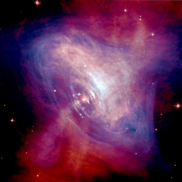 Jeden z nejznámějších pulsarů se nachází v srdci Krabí mlhoviny v souhvězdí Býka. Vydává záblesky s periodou 33 milisekund. Fotografie okolí pulsaru v Krabí mlhovině je složena z rentgenových (modrá barva) a optických (červená barva) snímků. Autor: optický obor NASA/HST/ASU/J. Hester et al.; rentgenový obor NASA/CXC/ASU/J. Hester et al.