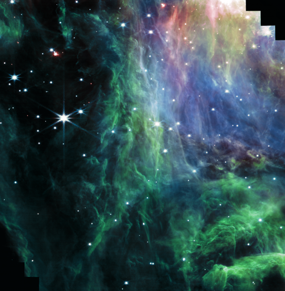 Severozápadní část středu mlhoviny v Orionu (M42). Vědci z týmu PDRs4All na něm vidí žábu. Možná sedí vpravo dole a vykukuje na nás.. Autor: NASA, ESA, CSA, PDRs4All ERS Team; image processing Salomé Fuenmayor